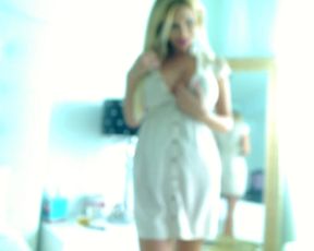 Busty blonde role-playing as a sexy secretary