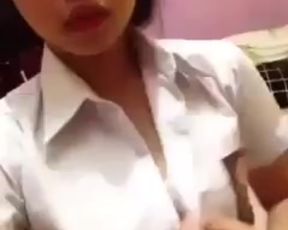 Malay babe showing off boobs for camera