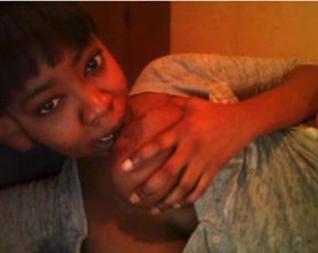 Ebony_Chick_Sucks_Her_Own_Big_Tits